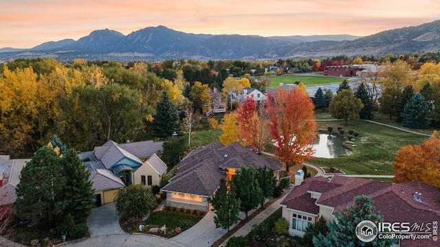 aerial view at dusk with a mountain view