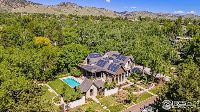 3621 21st St, Boulder, CO 80304 - view of subject property featuring a forest and a mountainous background