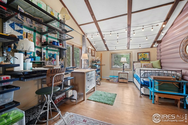 interior space featuring track lighting, log walls, light wood-type flooring, and baseboard heating