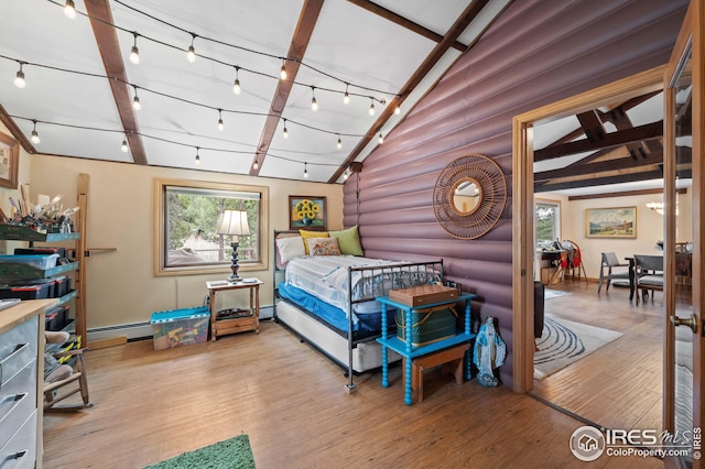 bedroom with vaulted ceiling with beams, log walls, multiple windows, and light wood-type flooring