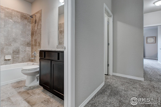 full bathroom featuring vanity, toilet, and tiled shower / bath combo