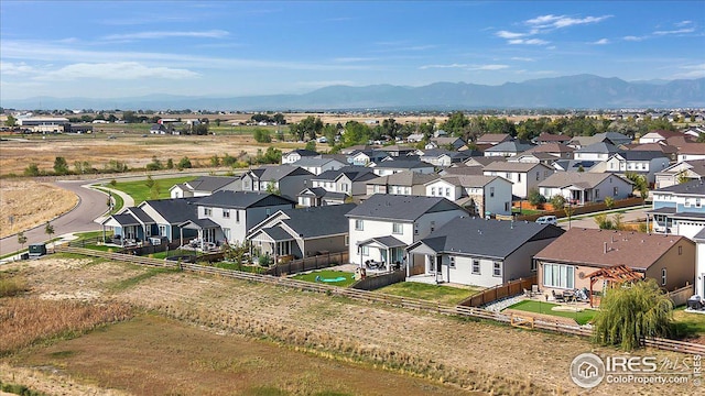 bird's eye view with a mountain view and a residential view