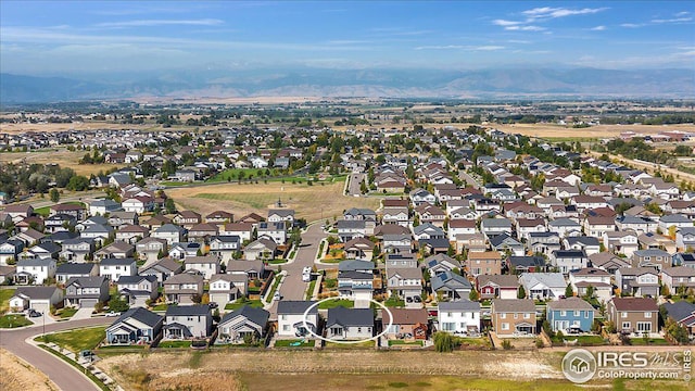 bird's eye view featuring a residential view and a mountain view