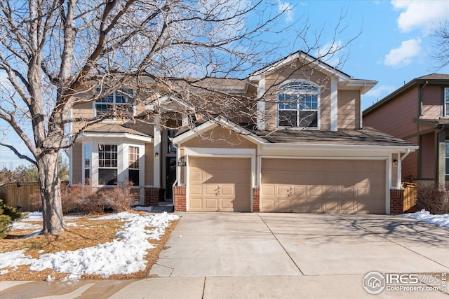 view of front of property with a garage