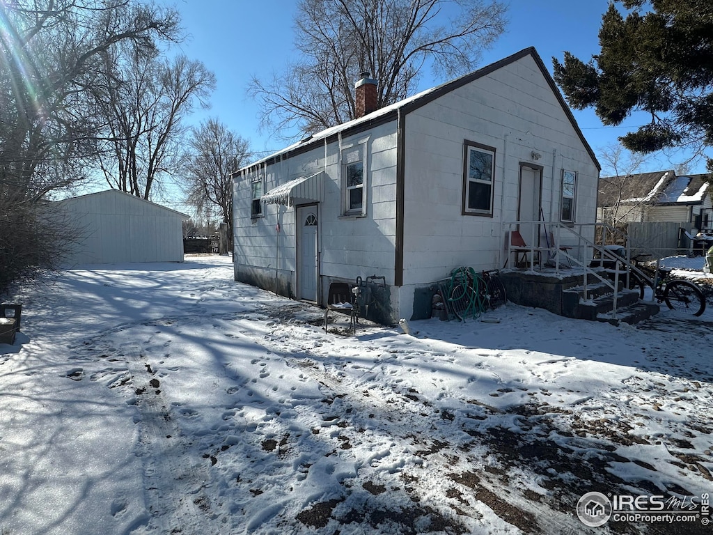 view of snow covered property