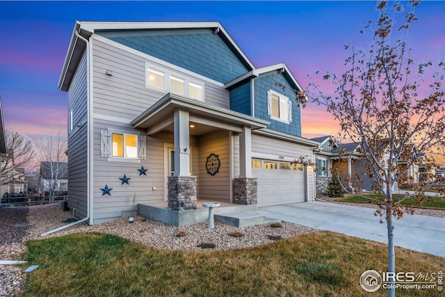 view of front of property with a garage