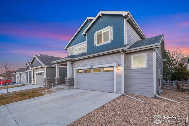 craftsman inspired home featuring a garage