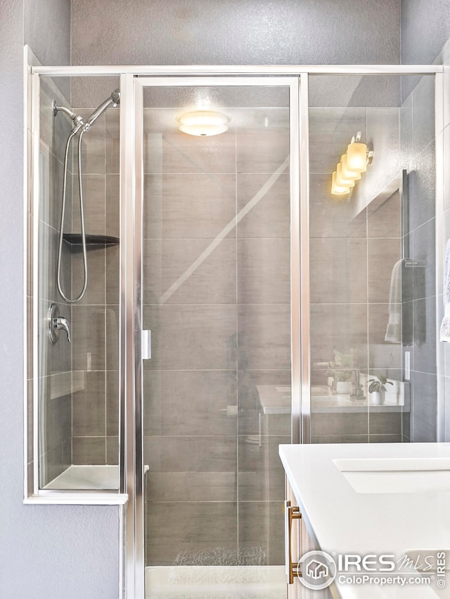 bathroom with an enclosed shower