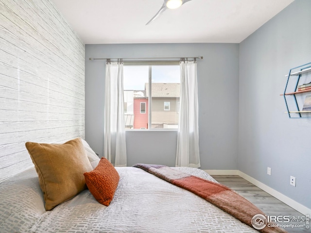 bedroom featuring hardwood / wood-style flooring