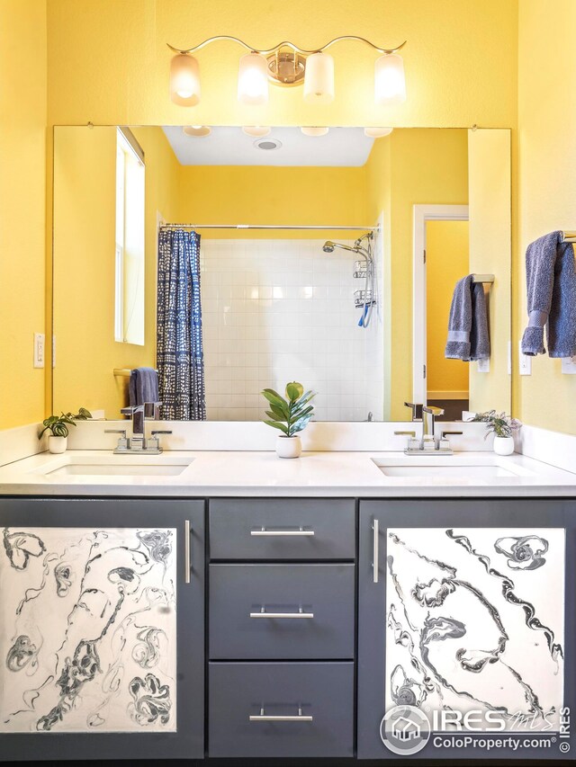 bathroom with vanity and a shower with curtain