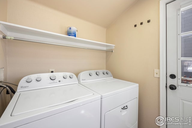 laundry room with washer and clothes dryer