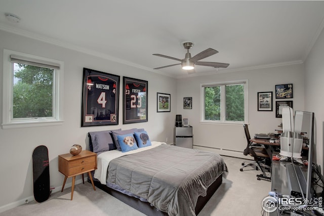 bedroom with ornamental molding, light colored carpet, ceiling fan, and baseboard heating