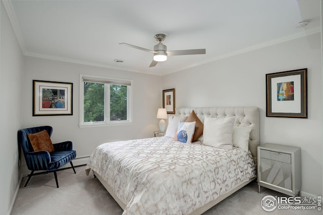 bedroom with ceiling fan, ornamental molding, carpet flooring, and a baseboard heating unit