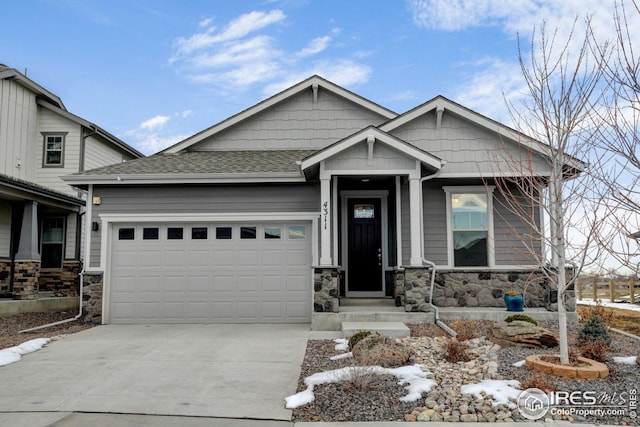 craftsman-style house featuring a garage