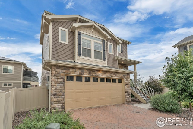 view of front of property with a garage