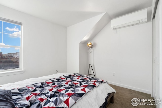 bedroom with carpet floors and a wall mounted air conditioner