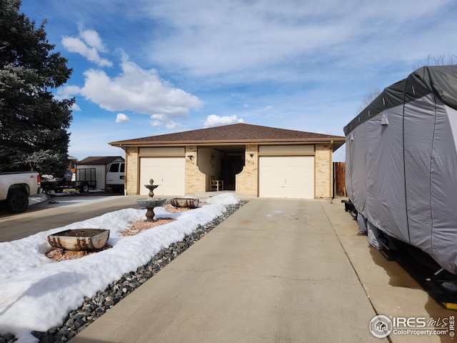 single story home with a garage