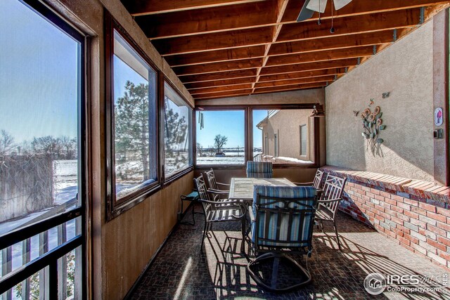 420 E County Road 10, Berthoud, CO 80513 - sunroom with ceiling fan and outdoor dining space