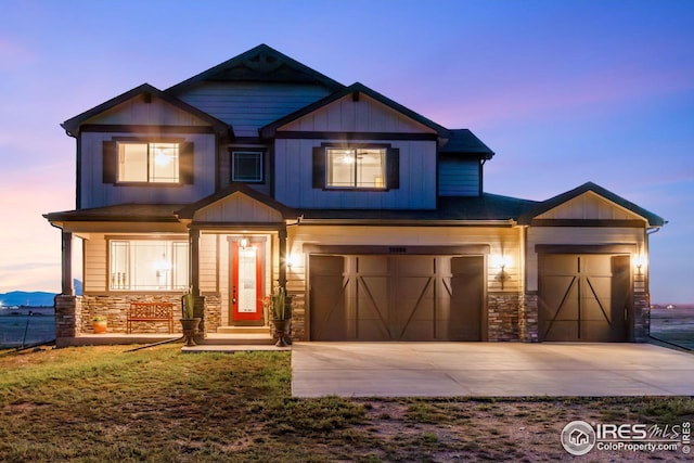 craftsman house with a garage