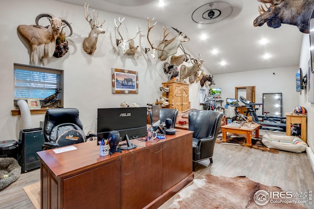 office area with light hardwood / wood-style flooring