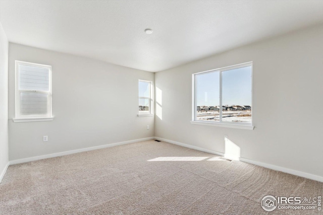 view of carpeted spare room