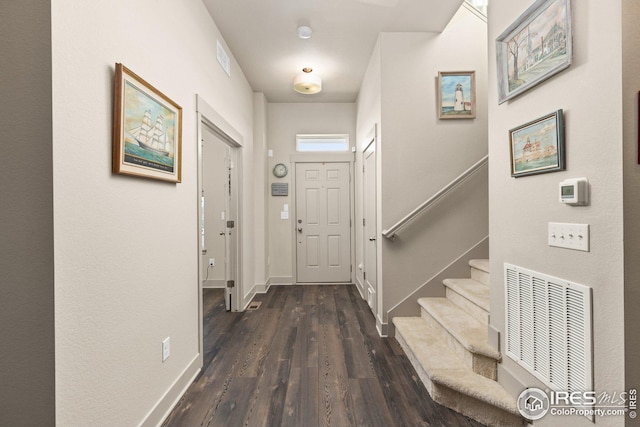 doorway featuring dark hardwood / wood-style flooring