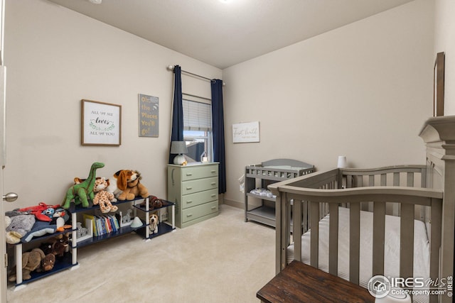 bedroom with light colored carpet