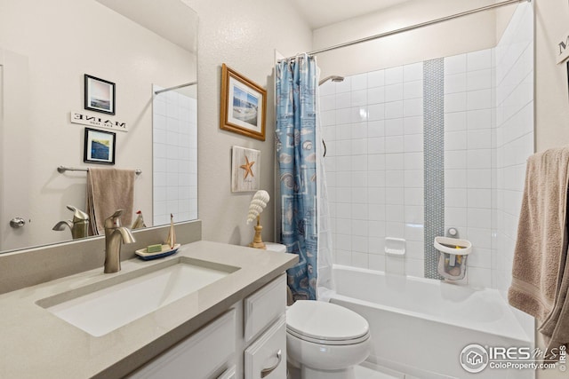 full bathroom featuring vanity, toilet, and shower / bath combo