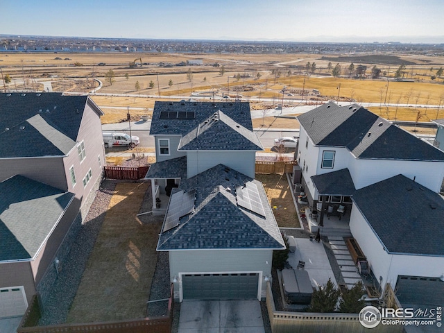 birds eye view of property featuring a rural view