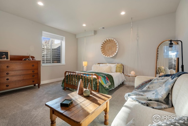 carpeted bedroom with recessed lighting, baseboards, and visible vents