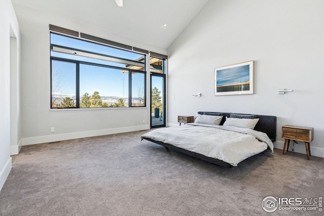 635 Paragon Dr, Boulder, CO 80303 - carpeted bedroom featuring access to outside and lofted ceiling