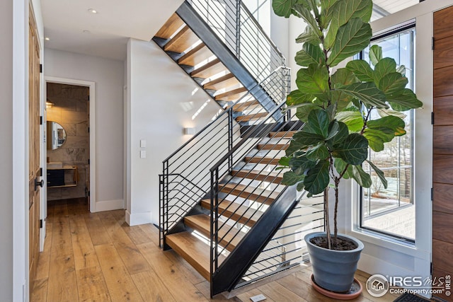 635 Paragon Dr, Boulder, CO 80303 - stairway featuring wood-type flooring and recessed lighting