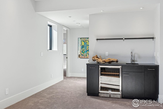 635 Paragon Dr, Boulder, CO 80303 - bar area featuring beverage cooler, light colored carpet, and recessed lighting