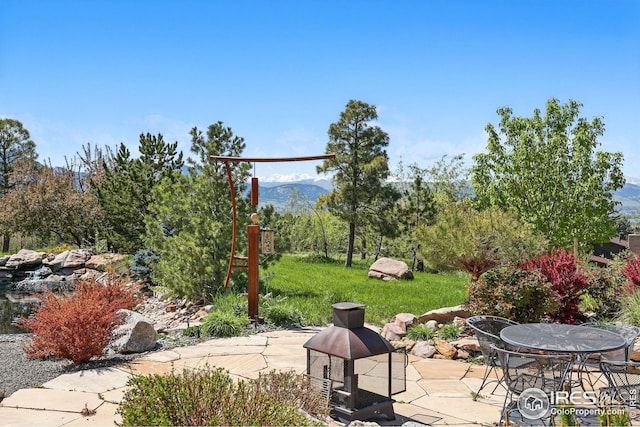 635 Paragon Dr, Boulder, CO 80303 - view of patio featuring a mountain view