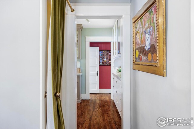 hall with dark wood-style floors