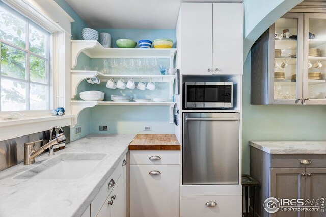 pantry with a sink