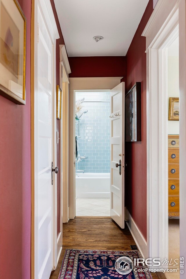 hall featuring dark wood-style floors