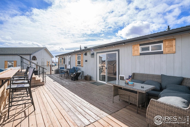 deck featuring an outdoor hangout area