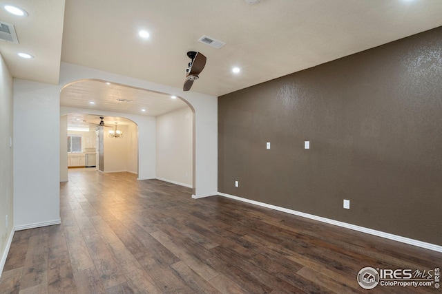 empty room featuring dark wood-type flooring