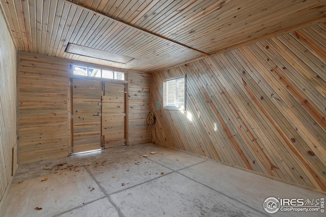 interior space featuring wood walls