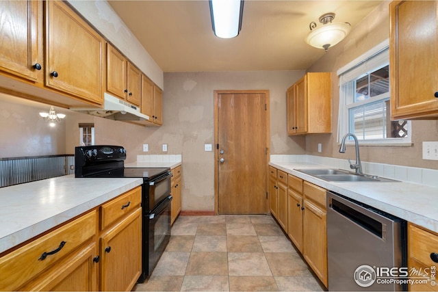 kitchen with sink, stainless steel dishwasher, and range with two ovens