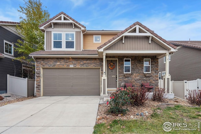 craftsman-style home with a garage