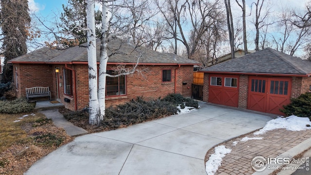 view of side of home with a garage