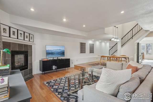 living room featuring hardwood / wood-style floors and a fireplace