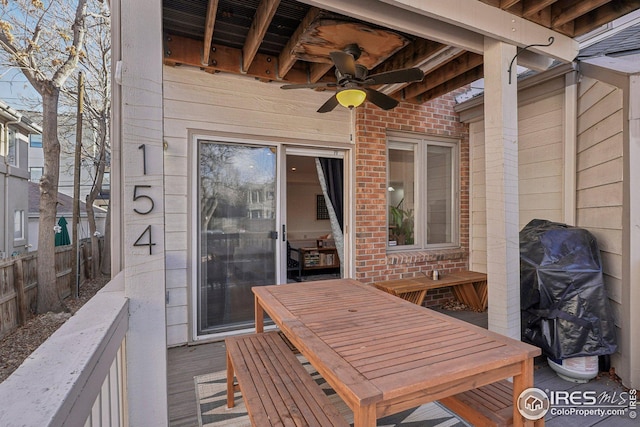 wooden deck with ceiling fan