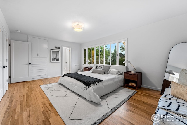 bedroom featuring light hardwood / wood-style flooring