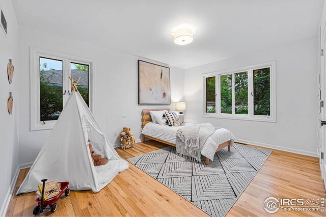 bedroom featuring hardwood / wood-style floors