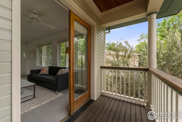 wooden deck with ceiling fan