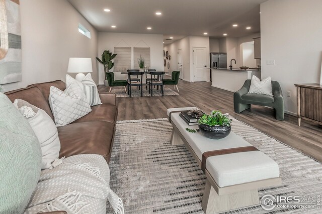 unfurnished living room with light hardwood / wood-style flooring