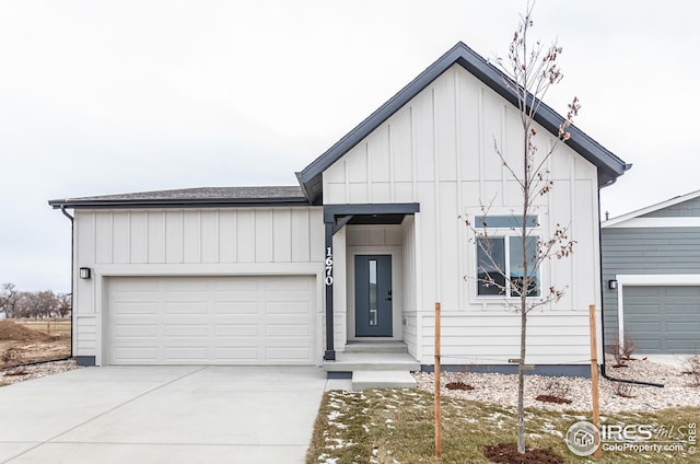 modern inspired farmhouse featuring a garage